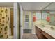 Clean bathroom with a single sink vanity and shower/tub combo at 1801 N Ocean Blvd. # K1, North Myrtle Beach, SC 29582