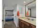 Bathroom with a single sink vanity and mirror at 1801 N Ocean Blvd. # K1, North Myrtle Beach, SC 29582