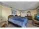 Bedroom with two double beds and ocean view artwork at 1801 N Ocean Blvd. # K1, North Myrtle Beach, SC 29582