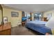 Bright bedroom with a queen bed and access to a balcony at 1801 N Ocean Blvd. # K1, North Myrtle Beach, SC 29582