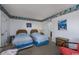 Twin bedroom with two twin beds and an adjacent bathroom at 1801 N Ocean Blvd. # K1, North Myrtle Beach, SC 29582