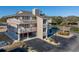 Elevated view of condo building showcasing balcony and parking at 1801 N Ocean Blvd. # K1, North Myrtle Beach, SC 29582