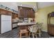 Galley kitchen with wood cabinets and appliances at 1801 N Ocean Blvd. # K1, North Myrtle Beach, SC 29582