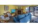 Bright living room with fireplace and access to deck at 1801 N Ocean Blvd. # K1, North Myrtle Beach, SC 29582
