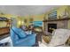 Living room with fireplace, comfortable seating and coastal decor at 1801 N Ocean Blvd. # K1, North Myrtle Beach, SC 29582