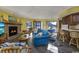 Living room with fireplace, TV, and comfortable seating at 1801 N Ocean Blvd. # K1, North Myrtle Beach, SC 29582