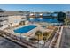 Community pool and sundeck area with palm trees at 1801 N Ocean Blvd. # K1, North Myrtle Beach, SC 29582