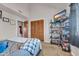 Bedroom with double bed, closet, and built-in shelving at 1881 Colony Dr. # 7D, Surfside Beach, SC 29575