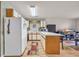 Galley kitchen with white appliances and wood cabinets at 1881 Colony Dr. # 7D, Surfside Beach, SC 29575