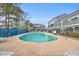 Community kidney-shaped swimming pool at 1881 Colony Dr. # 7D, Surfside Beach, SC 29575