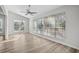 Sunroom with hardwood floors, ceiling fan, and multiple windows at 2307 Blackbird Ct., Murrells Inlet, SC 29576