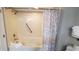 Bathroom with shower/tub, grab bar, and patterned shower curtain at 2504 N Ocean Blvd. # 1633, Myrtle Beach, SC 29577