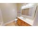 Bathroom with single vanity and mirror, featuring tile floors at 257 Venice Way # H 204, Myrtle Beach, SC 29577