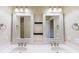 Bright bathroom with double sink vanity, decorative mirrors and lighting at 257 Venice Way # H 204, Myrtle Beach, SC 29577