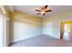 Spacious bedroom featuring plush carpet, ceiling fan, and neutral paint at 257 Venice Way # H 204, Myrtle Beach, SC 29577