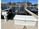 Dock with boat lift and storage, offering convenience for water activities at 257 Venice Way # H 204, Myrtle Beach, SC 29577