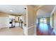 Modern kitchen with white cabinets, stainless steel appliances, granite countertops, and a breakfast bar overlooking the living area at 257 Venice Way # H 204, Myrtle Beach, SC 29577