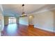 Bright living room featuring hardwood floors and access to the outdoor balcony at 257 Venice Way # H 204, Myrtle Beach, SC 29577