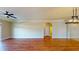 Large living room with wood floors and neutral walls at 257 Venice Way # H 204, Myrtle Beach, SC 29577