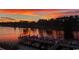 Sunset view over the water featuring a boat dock and a colorful sky at 257 Venice Way # H 204, Myrtle Beach, SC 29577