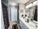 Double vanity bathroom with large mirror and shower/tub combo at 270 Connemara Dr. # C, Myrtle Beach, SC 29579