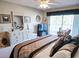 Spacious Primary bedroom with large bed, dresser, and access to balcony at 270 Connemara Dr. # C, Myrtle Beach, SC 29579