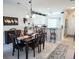 Dining room with dark wood table and chairs, kitchen view at 270 Connemara Dr. # C, Myrtle Beach, SC 29579