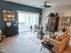 Living room with comfy sofas, blue walls, and patio access at 270 Connemara Dr. # C, Myrtle Beach, SC 29579