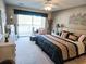 Large main bedroom with king-size bed, private balcony and golf course views at 270 Connemara Dr. # C, Myrtle Beach, SC 29579