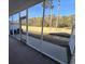 Screened porch overlooking a peaceful golf course and tranquil waterway at 270 Connemara Dr. # C, Myrtle Beach, SC 29579