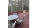 View of backyard from patio with table at 35 Dornoch Dr., Pawleys Island, SC 29585