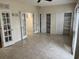 Spacious bonus room with tile flooring and ample storage with dual closets and french door entry at 35 Dornoch Dr., Pawleys Island, SC 29585