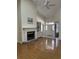 Bright living room with hardwood floors, fireplace, and vaulted ceiling at 35 Dornoch Dr., Pawleys Island, SC 29585