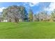 House with large green lawn and mature trees at 3703 Green Sea Rd., Green Sea, SC 29545