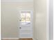 Back door leading to the backyard, offering access outdoors at 3703 Green Sea Rd., Green Sea, SC 29545