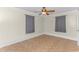 Spacious bedroom with ceiling fan and patterned tile floors at 3703 Green Sea Rd., Green Sea, SC 29545