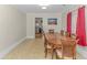 Dining room with hardwood floors and a large oval wooden table at 3703 Green Sea Rd., Green Sea, SC 29545