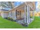 House exterior with a spacious porch and rocking chairs at 3703 Green Sea Rd., Green Sea, SC 29545