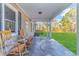 Relaxing front porch with rocking chairs and a swing at 3703 Green Sea Rd., Green Sea, SC 29545