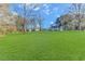 Tan house with white trim and spacious yard at 3703 Green Sea Rd., Green Sea, SC 29545