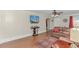 Bright living room featuring hardwood floors and a comfortable leather sofa at 3703 Green Sea Rd., Green Sea, SC 29545