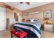 Coastal-themed bedroom with striped bedding and dresser at 4440 Turtle Ln. # 1C, Little River, SC 29566