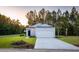 Newly built home with a one-car garage and landscaped lawn at 455 Ribbon Rail Way, Loris, SC 29569