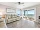 Living room with ocean view and access to balcony at 4600 N Ocean Blvd. # A3, North Myrtle Beach, SC 29582