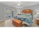 Spacious bedroom with king-size bed and private balcony access at 4850 Meadowsweet Dr. # 1711, Myrtle Beach, SC 29579
