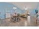 Bright dining area with seating for four and built-in shelving at 4850 Meadowsweet Dr. # 1711, Myrtle Beach, SC 29579