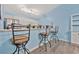 Breakfast bar with three stools and additional counter space at 4850 Meadowsweet Dr. # 1711, Myrtle Beach, SC 29579