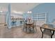 Open kitchen with white cabinets and a breakfast bar at 4850 Meadowsweet Dr. # 1711, Myrtle Beach, SC 29579