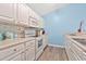 Well-equipped kitchen with white cabinets and modern appliances at 4850 Meadowsweet Dr. # 1711, Myrtle Beach, SC 29579