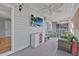 Relaxing screened porch with comfy seating and a TV at 4850 Meadowsweet Dr. # 1711, Myrtle Beach, SC 29579